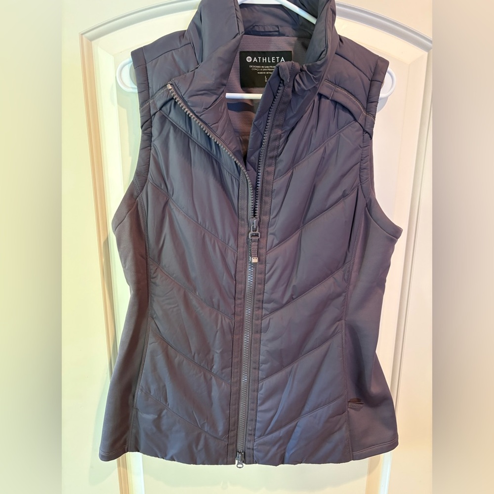 Athleta Stratus Puffer Vest in a grey/purple color. Size L.